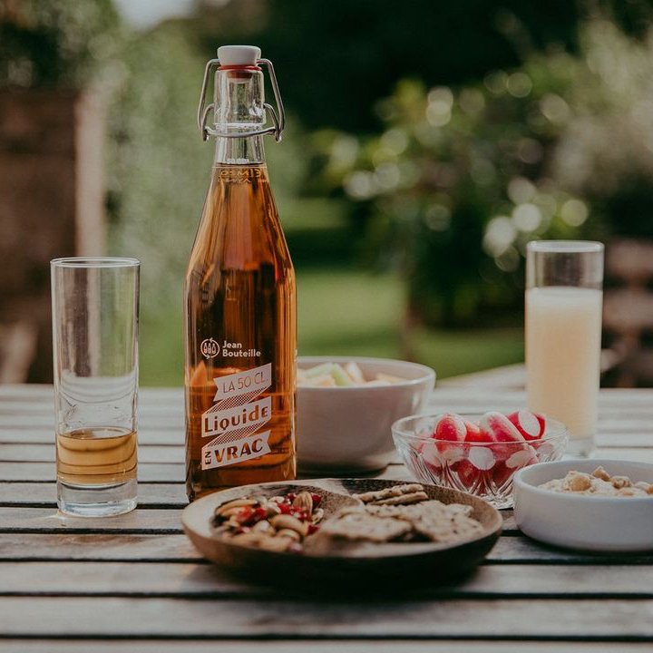 Produits Jean Bouteille dans une bouteille en verre consignée
